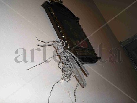 Mosquito en Alambre