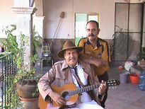 Rigo y padre pistolas