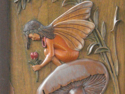 Niña mariposa (puerta)