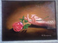 mano y rosa