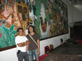 maestro e hijo frente a la obra