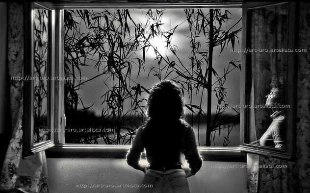 REFLEJO EN LA VENTANA