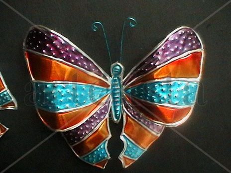 Mariposa en repujado