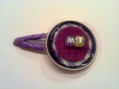 horquilla de fieltro violeta con cápsula nespresso