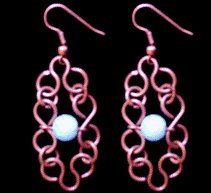 Aretes gusanito cobre