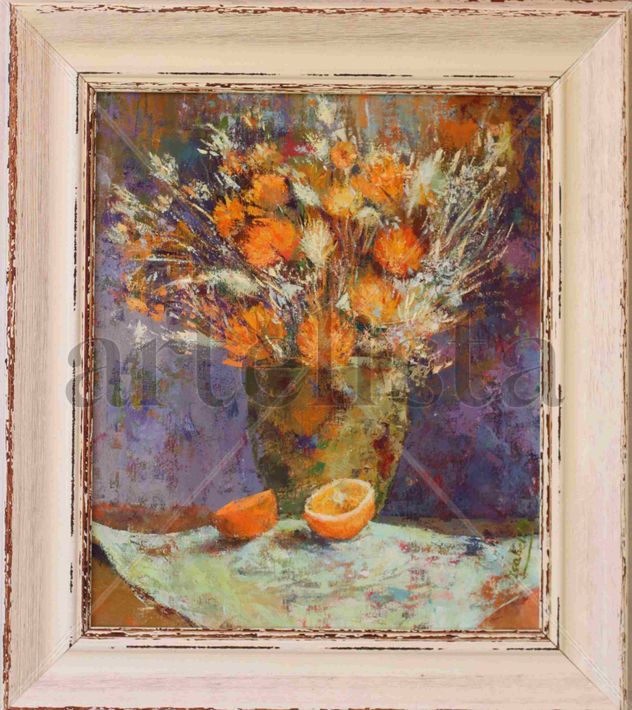 Cesta con flores y naranjas
