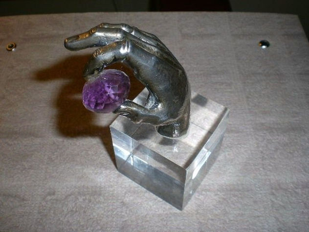 mano en plata de ley