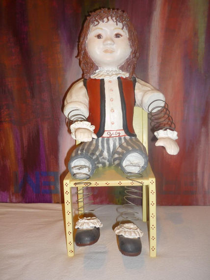 Muñeca en papel mache