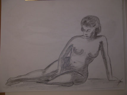 Desnuda sentada