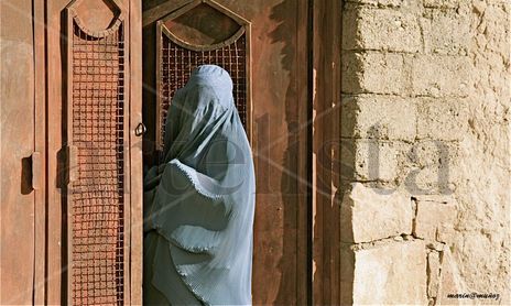 Enjauladas en un Burka