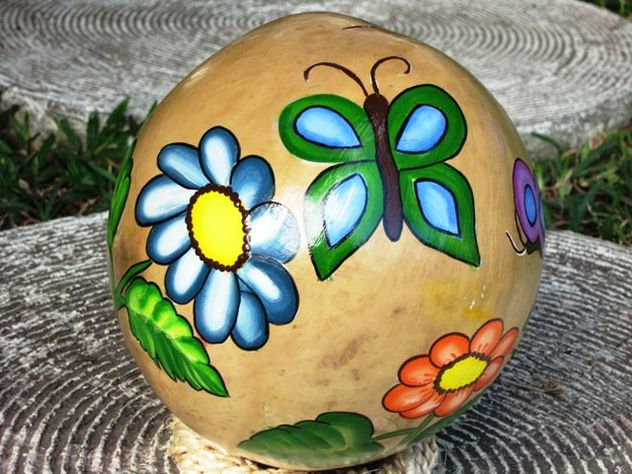 Alcancia con flores