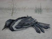 Dead bird in the snow