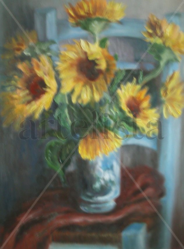 jarron con girasoles sobre silla