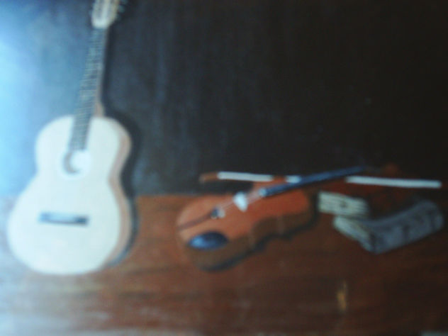 violin ,guitarra y libros