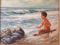 niño el la playa