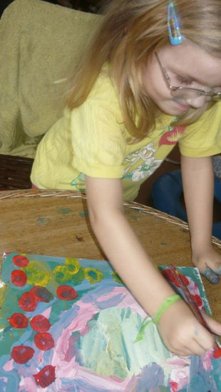 Lidia is painting at the age of 4 