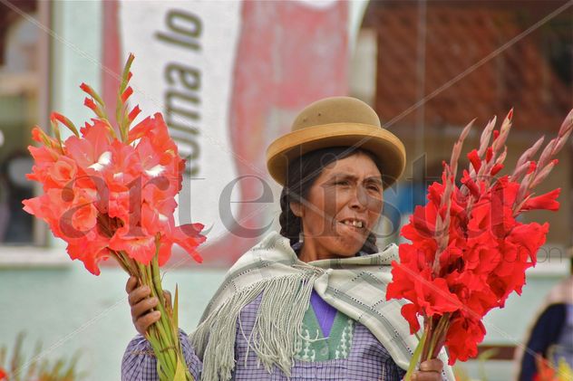 Vendedora de gladiolos.