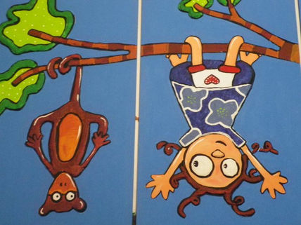 Niña colgada y Monito