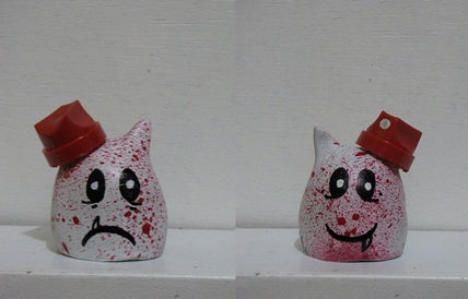 Spray-o-red cat