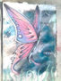 mariposa sobre fondo de ojos