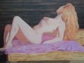 Mujer desnuda tomando sol