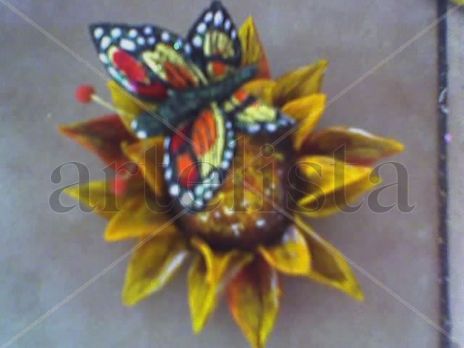 Mariposa con flor