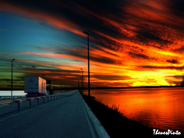 POR DO SOL NO LAGO DE PALMAS