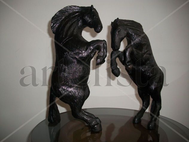 Pareja de caballos de ebano
