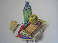 Manzana sobre libros