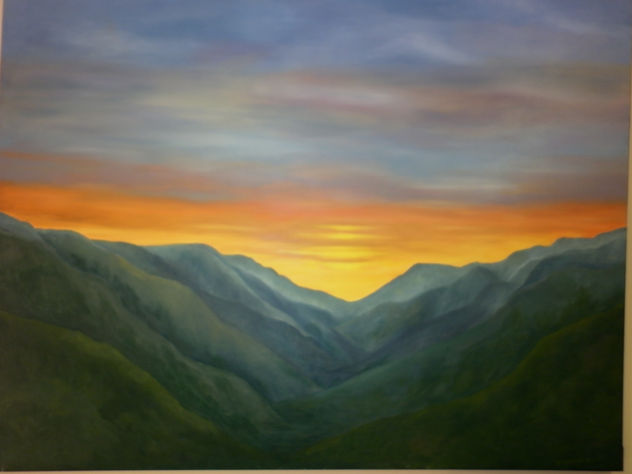 Atardecer entre montañas