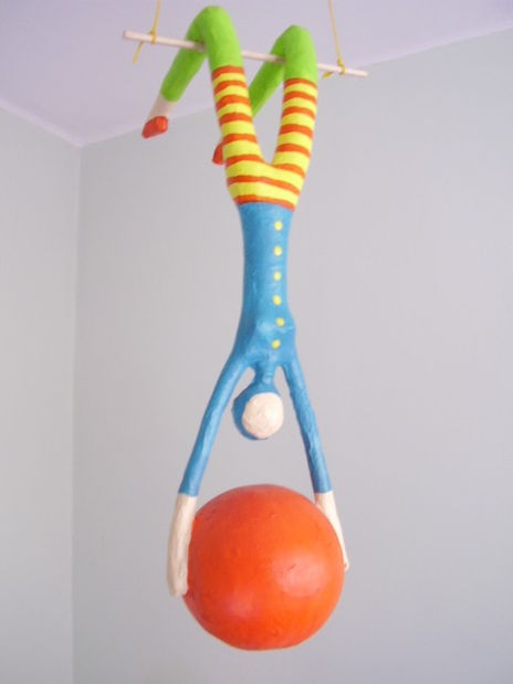 Trapecista con pelota