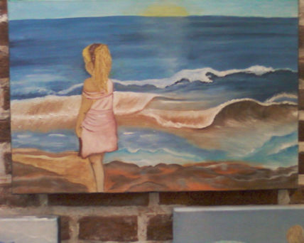 Niña mirando al mar