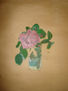 Rosa en un vaso