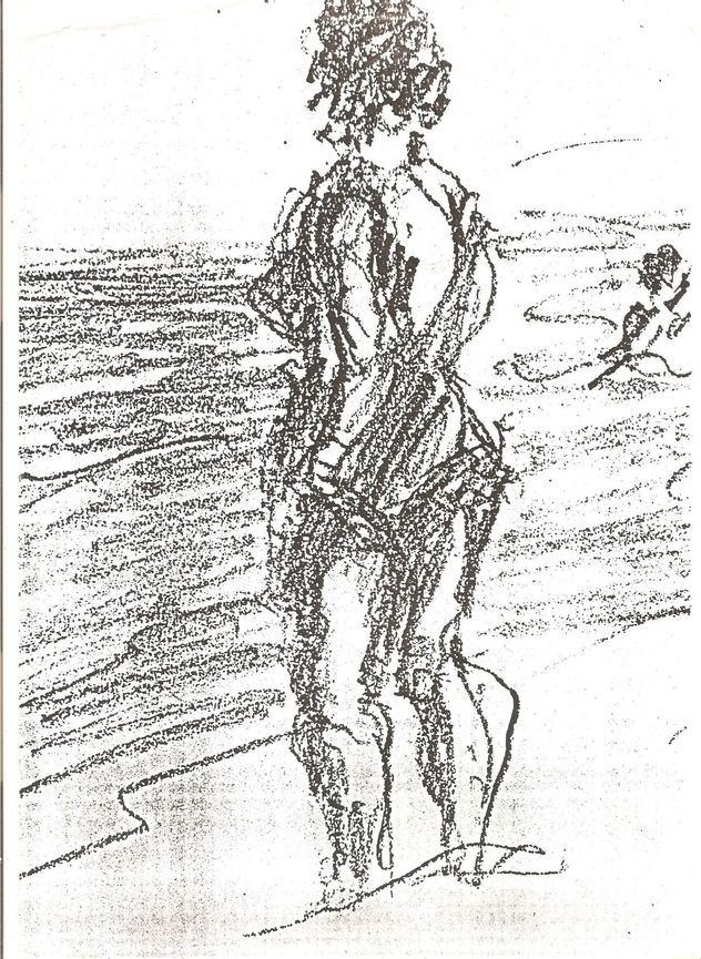 Una turista en laplaya de la Barceloneta.