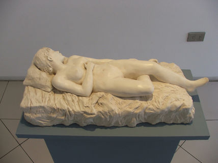 Desnudo en cama