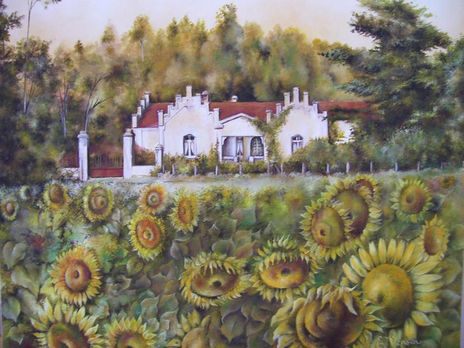 Casa con girasoles