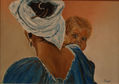 Mujer de azul con azul con niño