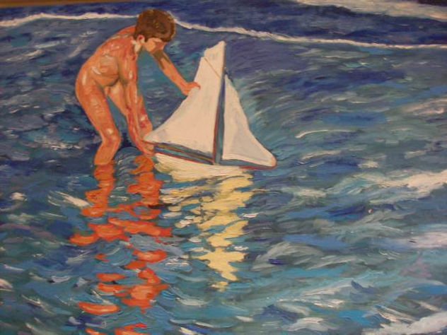 NIÑO EN LA PLAYA CON BARQUITO