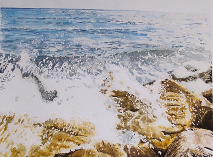 La ola y las rocas