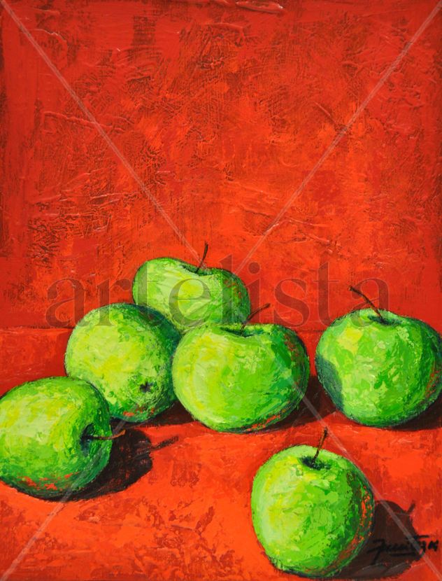 Manzanas verdes sobre fondo rojo