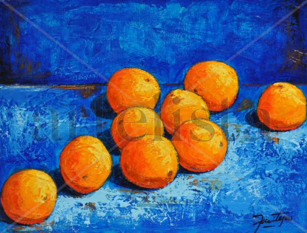 Naranjas sobre fondo azul
