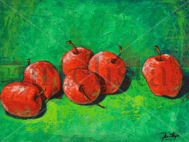 Manzanas rojas sobre fondo verde