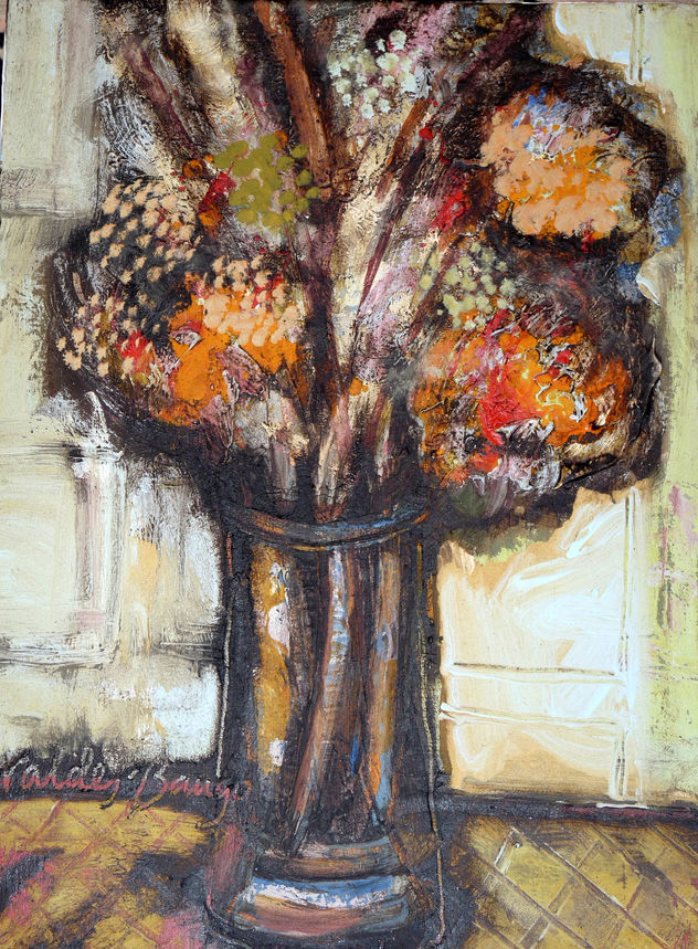 Jarrón con flores recogidas al aterdecer