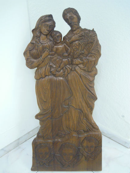 La Virgen y San...