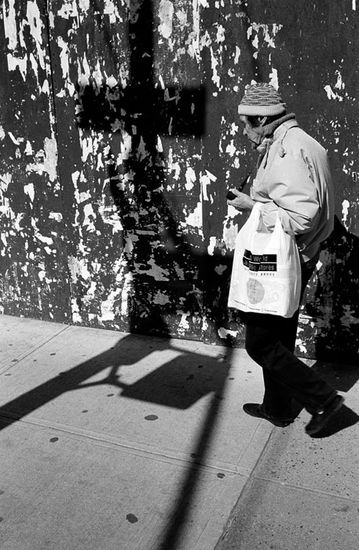 Man and Cross Photojournalism and Documentary Black and White (Manual)