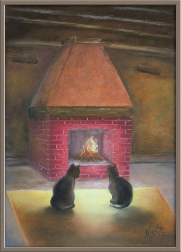Gatos frente a la chimenea