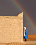 Rainbow and rain in the desert.