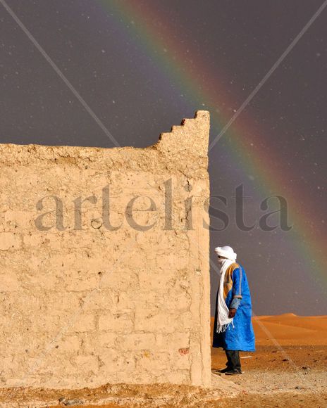 Rainbow and rain in...