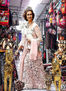- Retrato de Su majestad la Reina Doña Sofía de España visitando el Inka Market de Miraflores