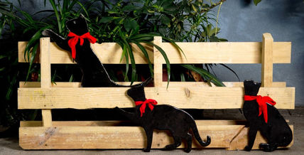 Gatos con lazo rojo